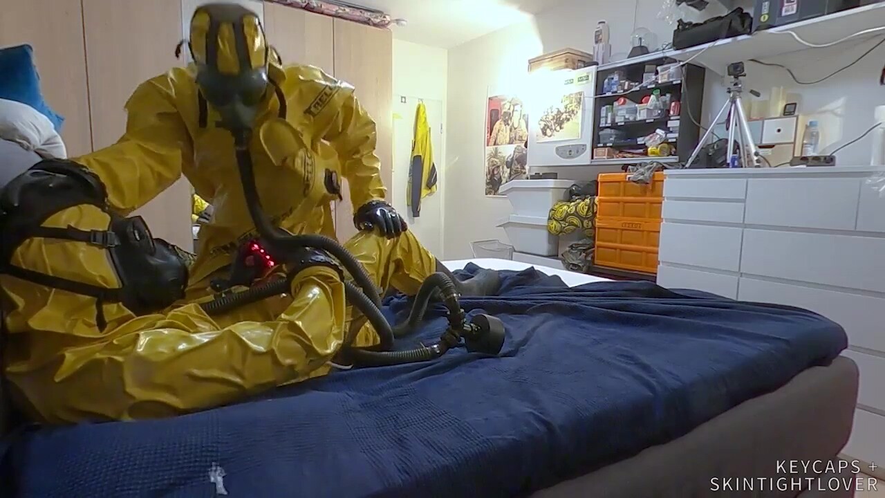 Vacuuming in tellchen hazmat suits